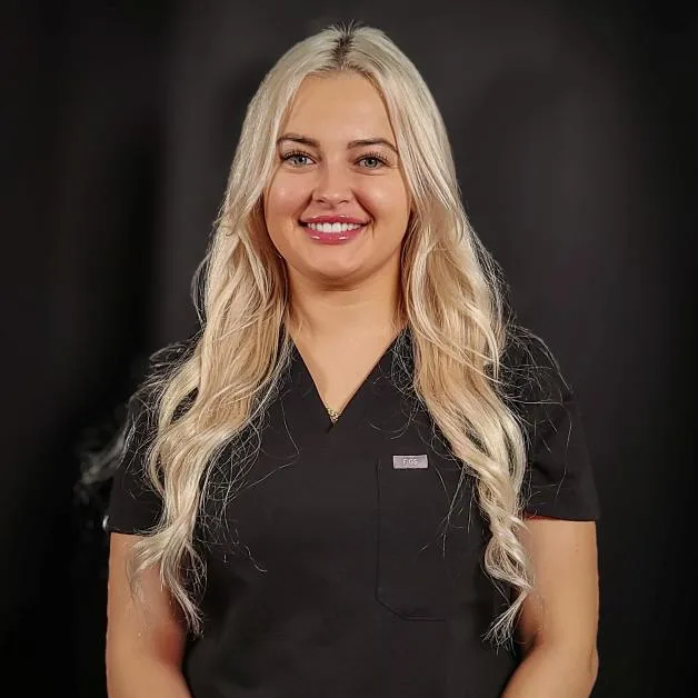 Angelika, a skilled nurse injector at Express Med Spa, expertly administering a cosmetic injection. She provides professional aesthetic treatments with precision and care, ensuring optimal results for clients seeking Botox, dermal fillers, and other medical spa services.