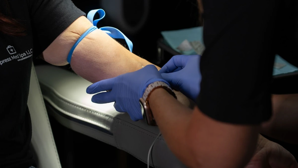 Healthcare professional drawing blood for advanced lab testing at Express Med Spa