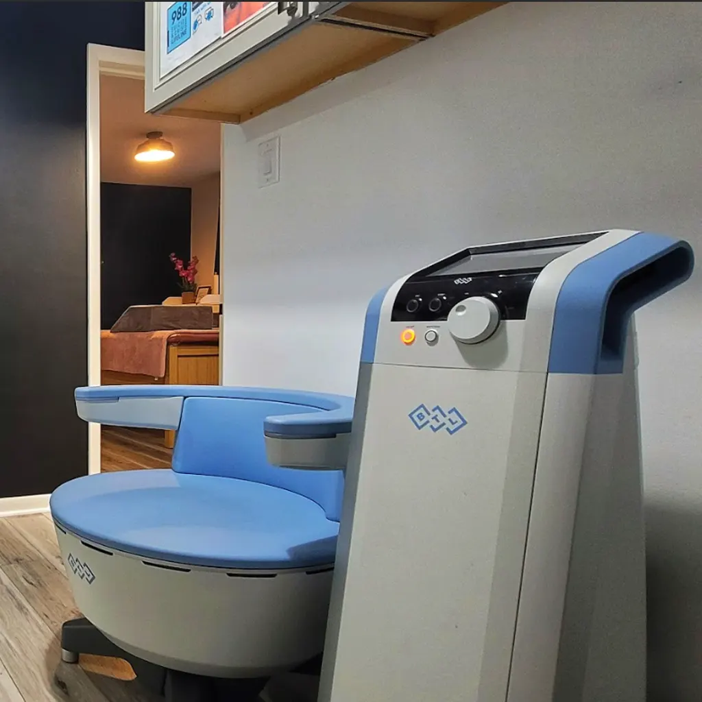 Emsella chair set up in a private Mount Greenwood treatment room for pelvic floor chair therapy