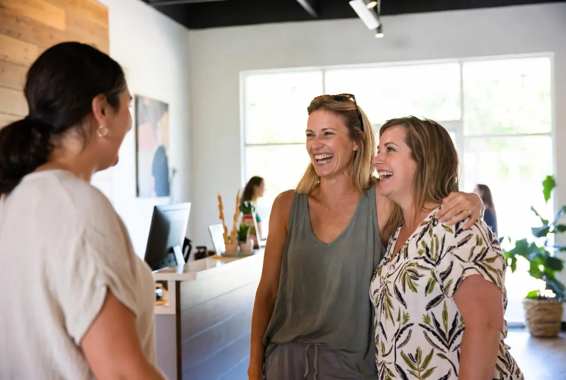 Group of women smiling and talking during a Botox injections girls night event at Express Med Spa in La Grange, Illinois.