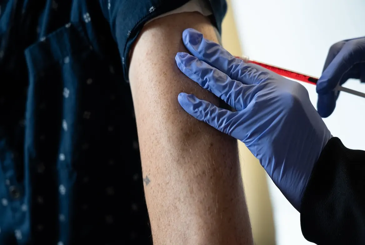 B12 shot being administered in the upper arm at Express Med Spa La Grange, IL