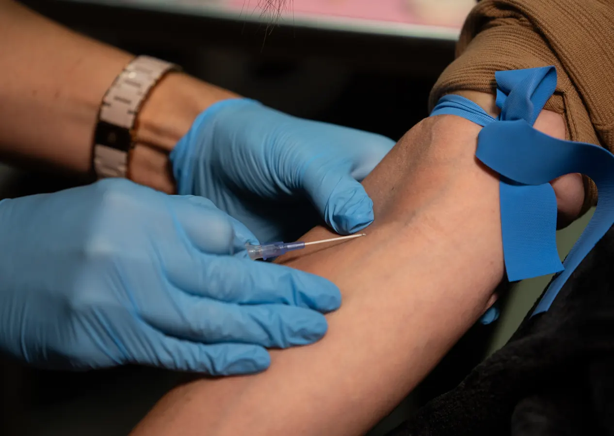 Nurse preparing a NAD+ IV therapy infusion at Express Med Spa in Manteno, IL