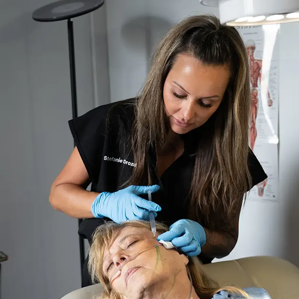Nurse practitioner performing aesthetic treatment at Express Med Spa Mount Greenwood