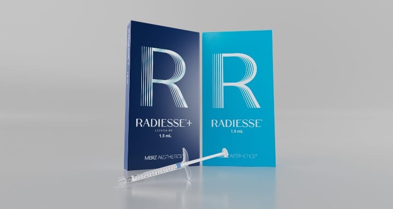 Stefanie Drozd, RN-BSN, standing outside Express Med Spas' Frankfort, IL location in professional medical attire