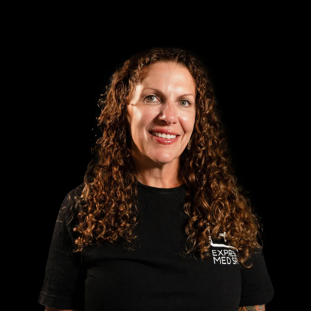 Michelle Forsythe, RN, registered nurse injector at Express Med Spa in Shorewood, IL, providing a Revanesse Versa+ dermal filler consultation.