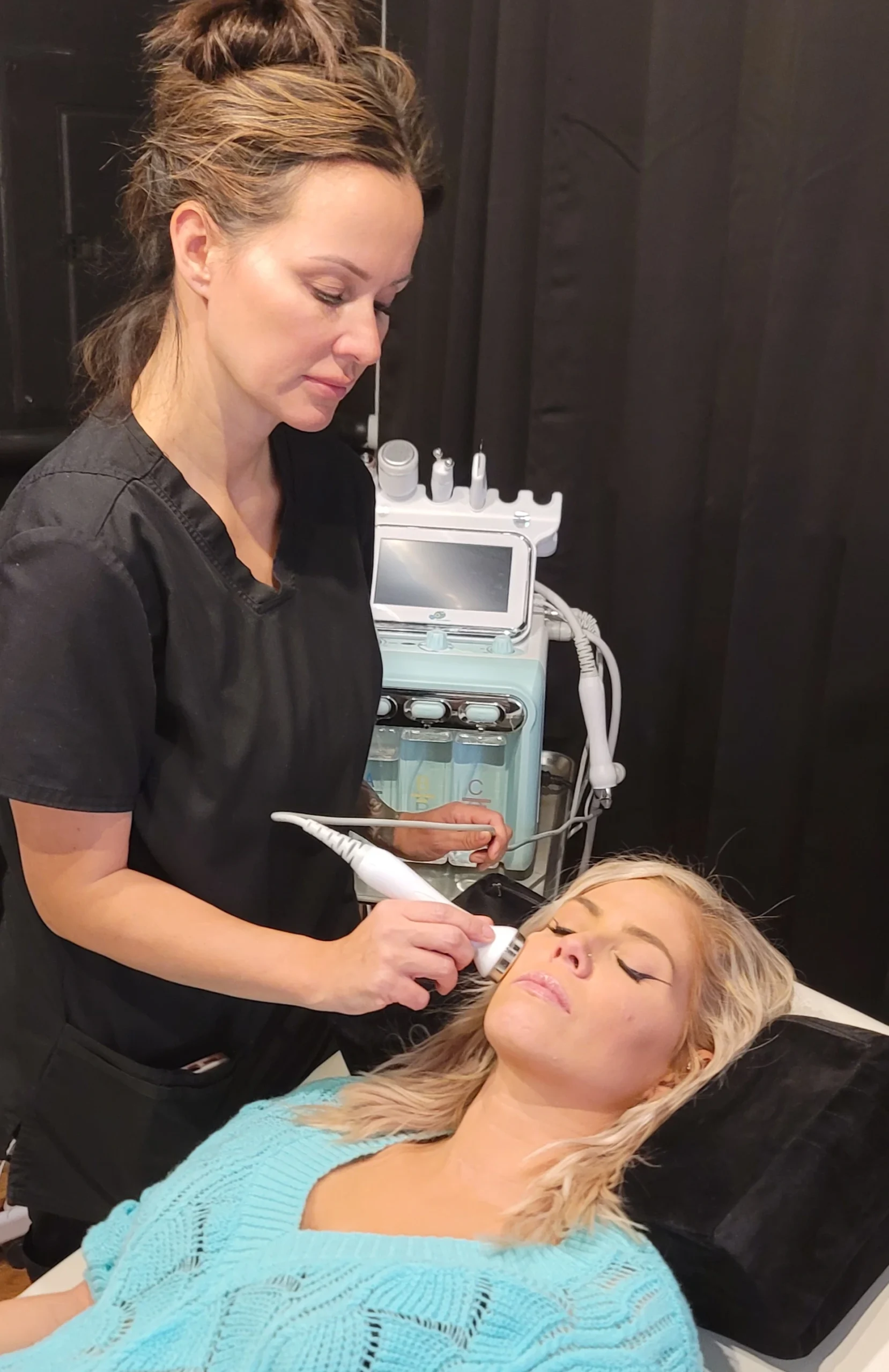 Client during the microcurrent phase of a STEM Facial at Express Med Spa in Manteno, IL
