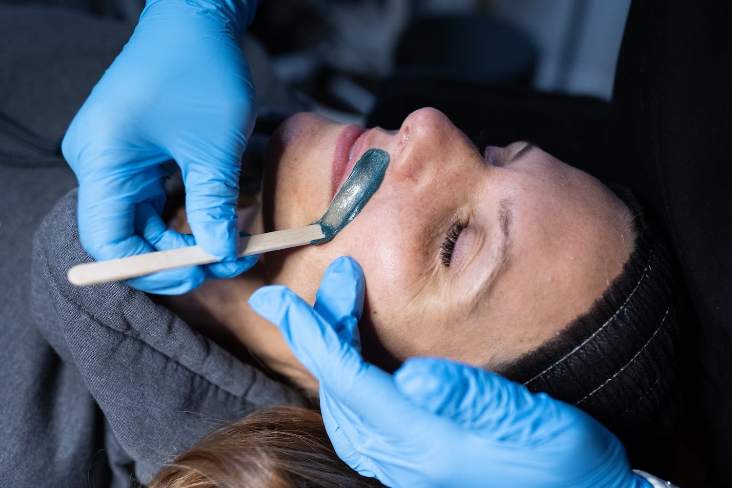 Stefanie Drozd, RN-BSN, standing outside Express Med Spas' Frankfort, IL location in professional medical attire
