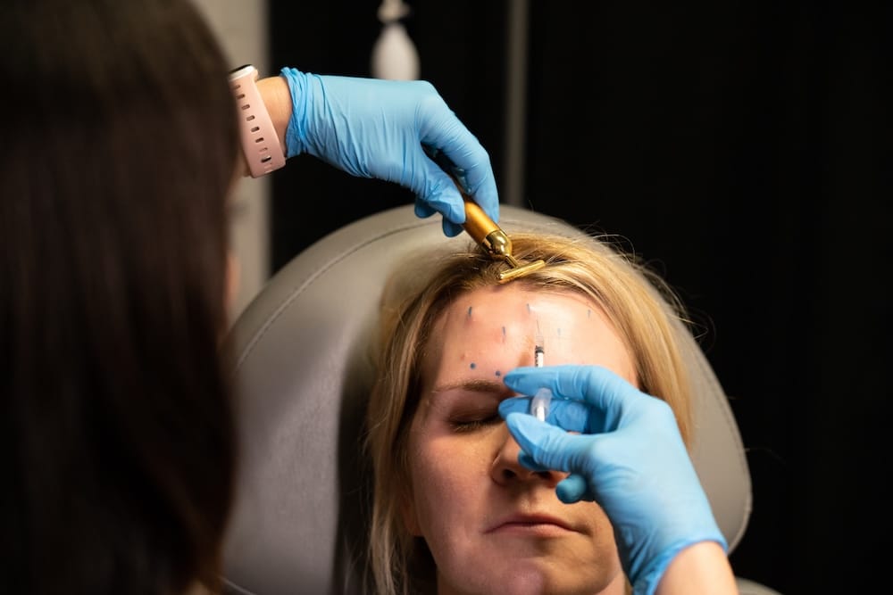 Close-up of Xeomin being injected into a patient’s forehead to treat horizontal lines at Express Med Spa near La Grange Park